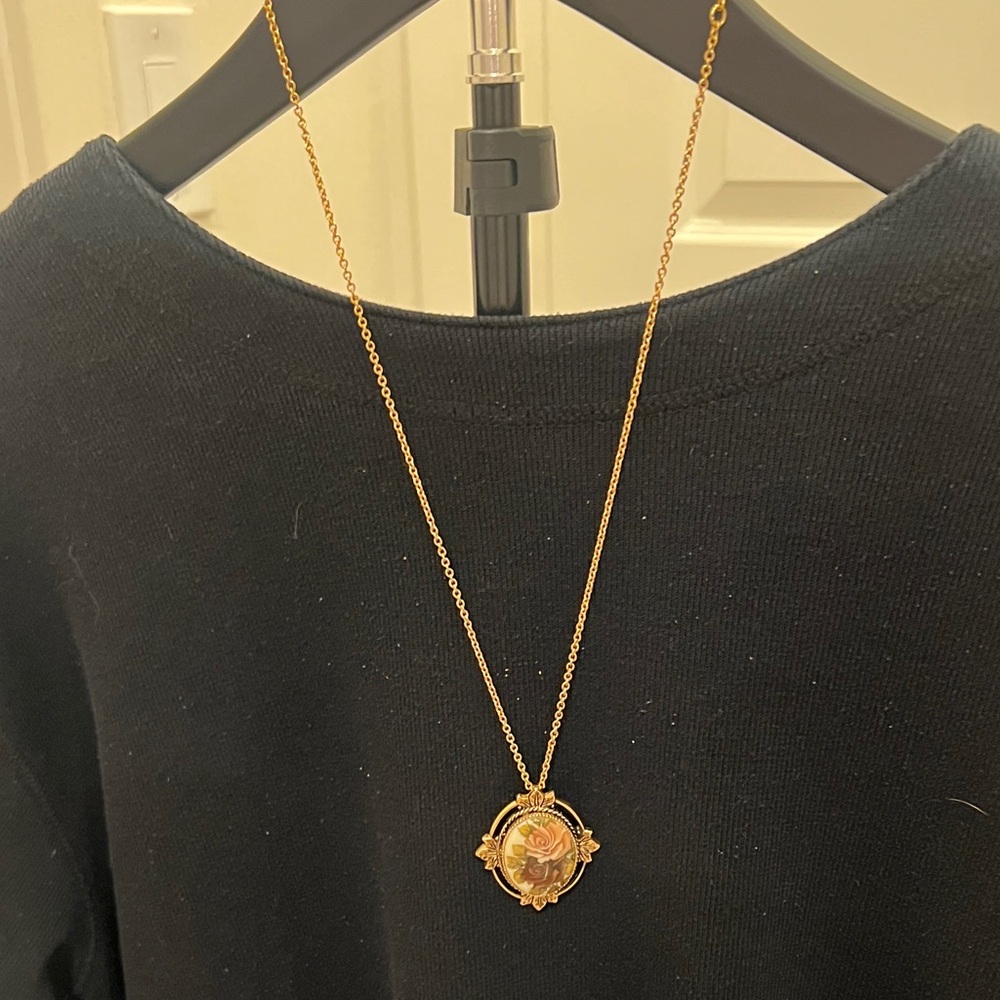 Sarah Coventry Gold Tone Rose Medallion Pendant Necklace with Pink Accent